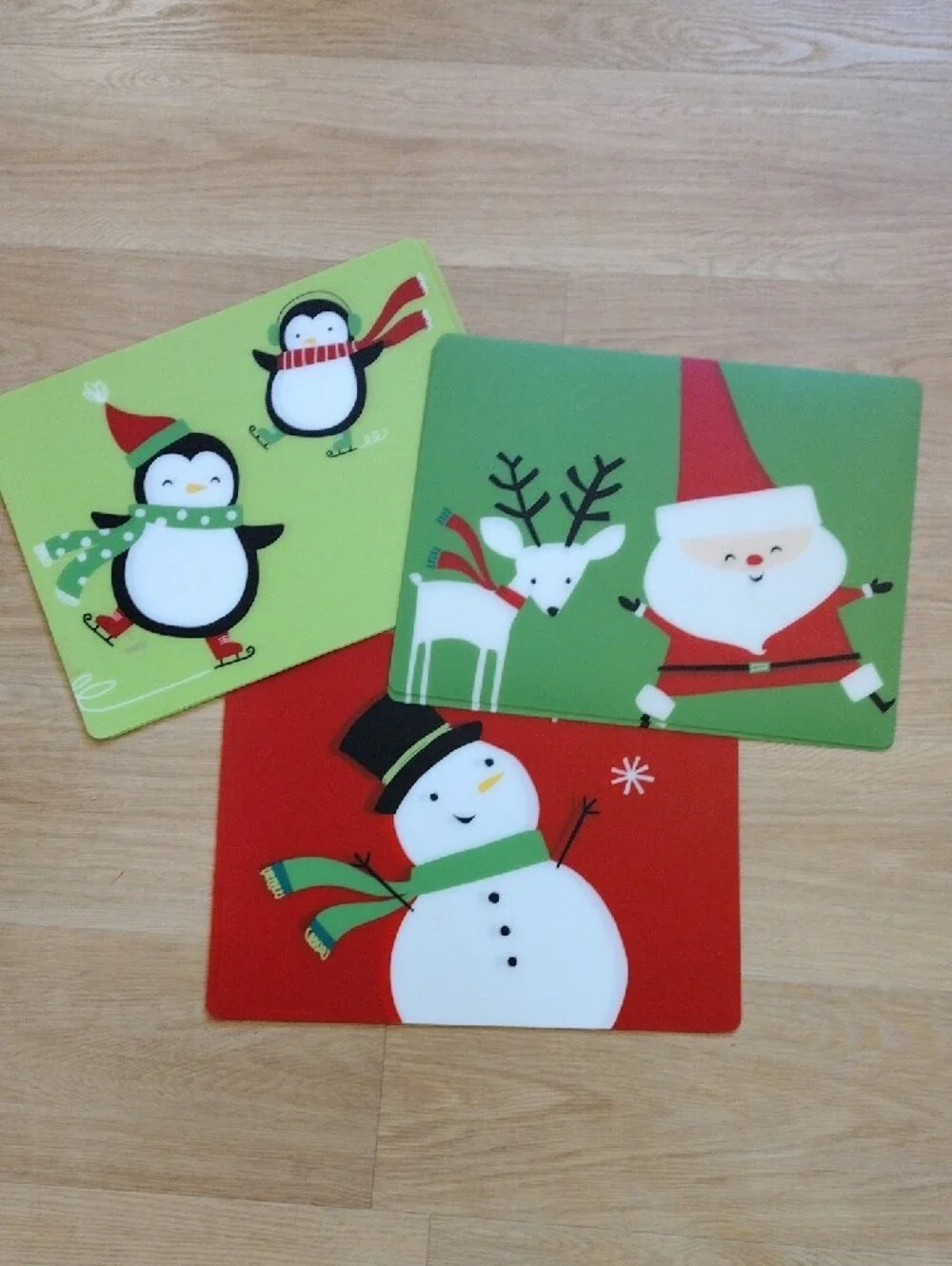 Target 2011 Christmas Holiday Placemats Set of 6 Santa Snowman Penguin 14 x 18